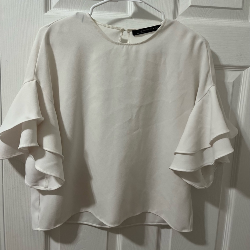 White ruffle sleeve blouse